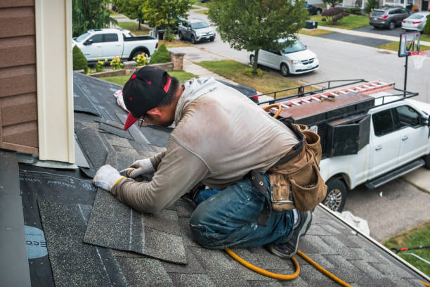 Professional Roofing technician working in New Lothrop, MI